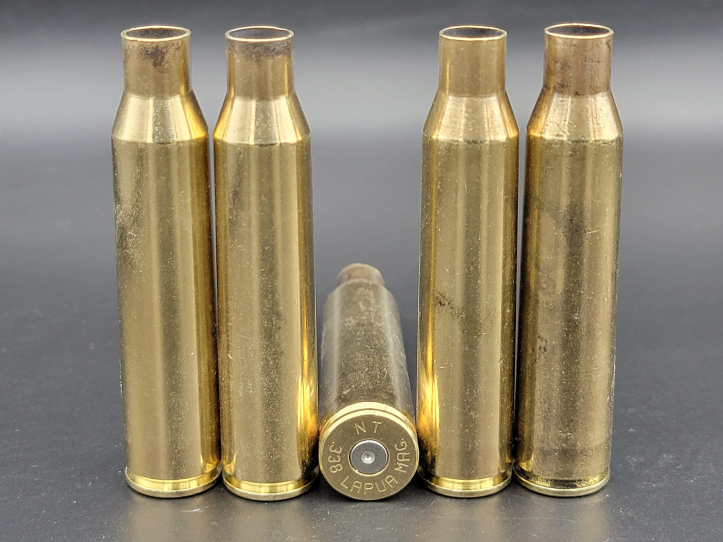 338 Lapua Mag once fired rifle brass. Hand sorted from reputable indoor/military ranges for reloading. Reliable spent casings for precision shooting.