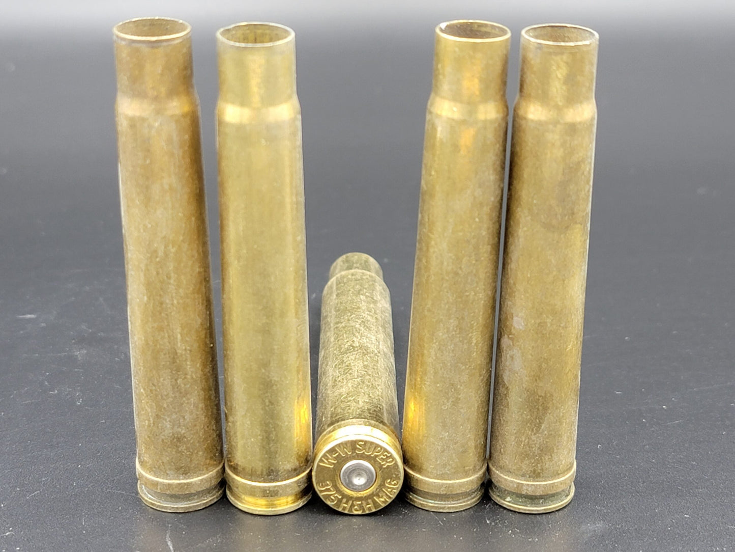 375 H&H Mag once fired rifle brass. Hand sorted from reputable indoor/military ranges for reloading. Reliable spent casings for precision shooting.