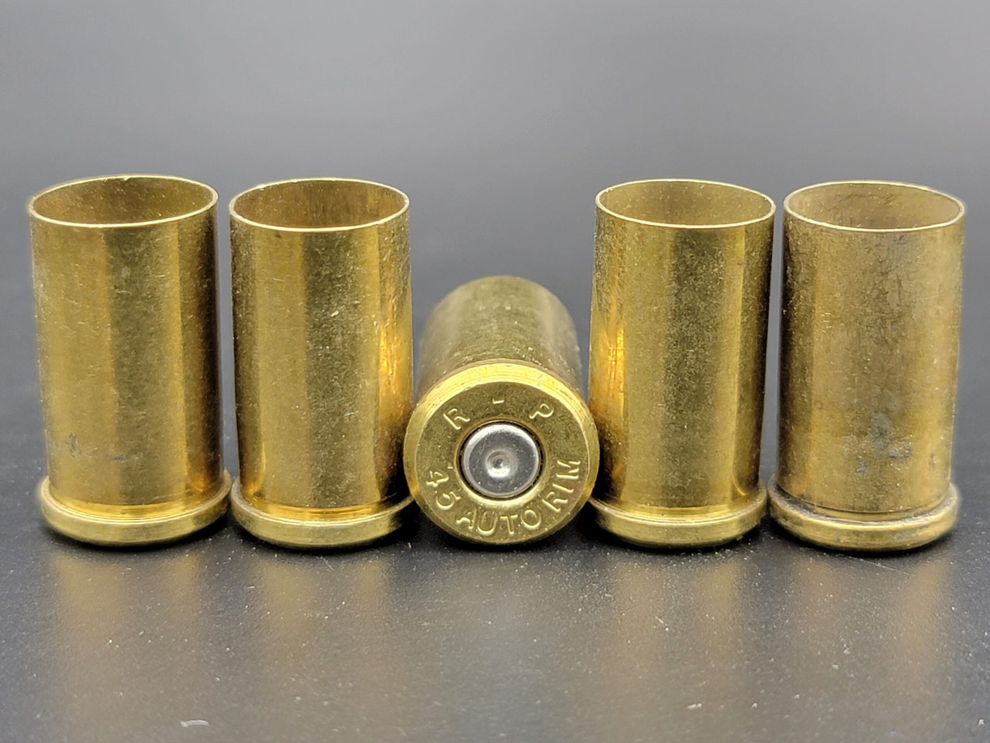 45 Auto Rimmed once fired pistol nickel. Hand sorted from reputable indoor/military ranges for reloading. Reliable spent casings for precision shooting.