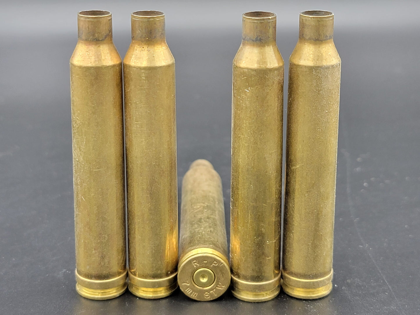 7mm STW once fired rifle brass. Hand sorted from reputable indoor/military ranges for reloading. Reliable spent casings for precision shooting.