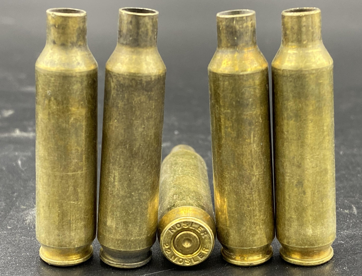 22 Nosler once fired rifle brass. Hand sorted from reputable indoor/military ranges for reloading. Reliable spent casings for precision shooting.