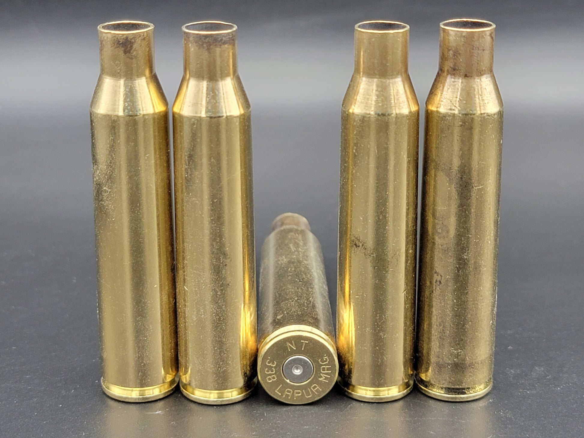 338 Lapua Mag once fired rifle brass. Hand sorted from reputable indoor/military ranges for reloading. Reliable spent casings for precision shooting.