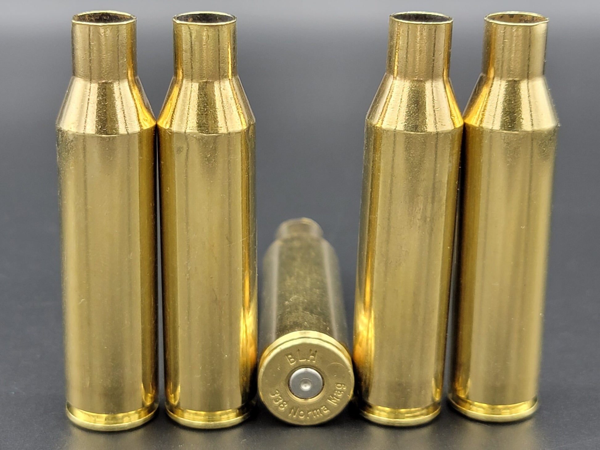 338 Norma Mag cleaned once fired rifle brass. Hand sorted from reputable indoor/military ranges for reloading. Reliable spent casings for precision shooting.