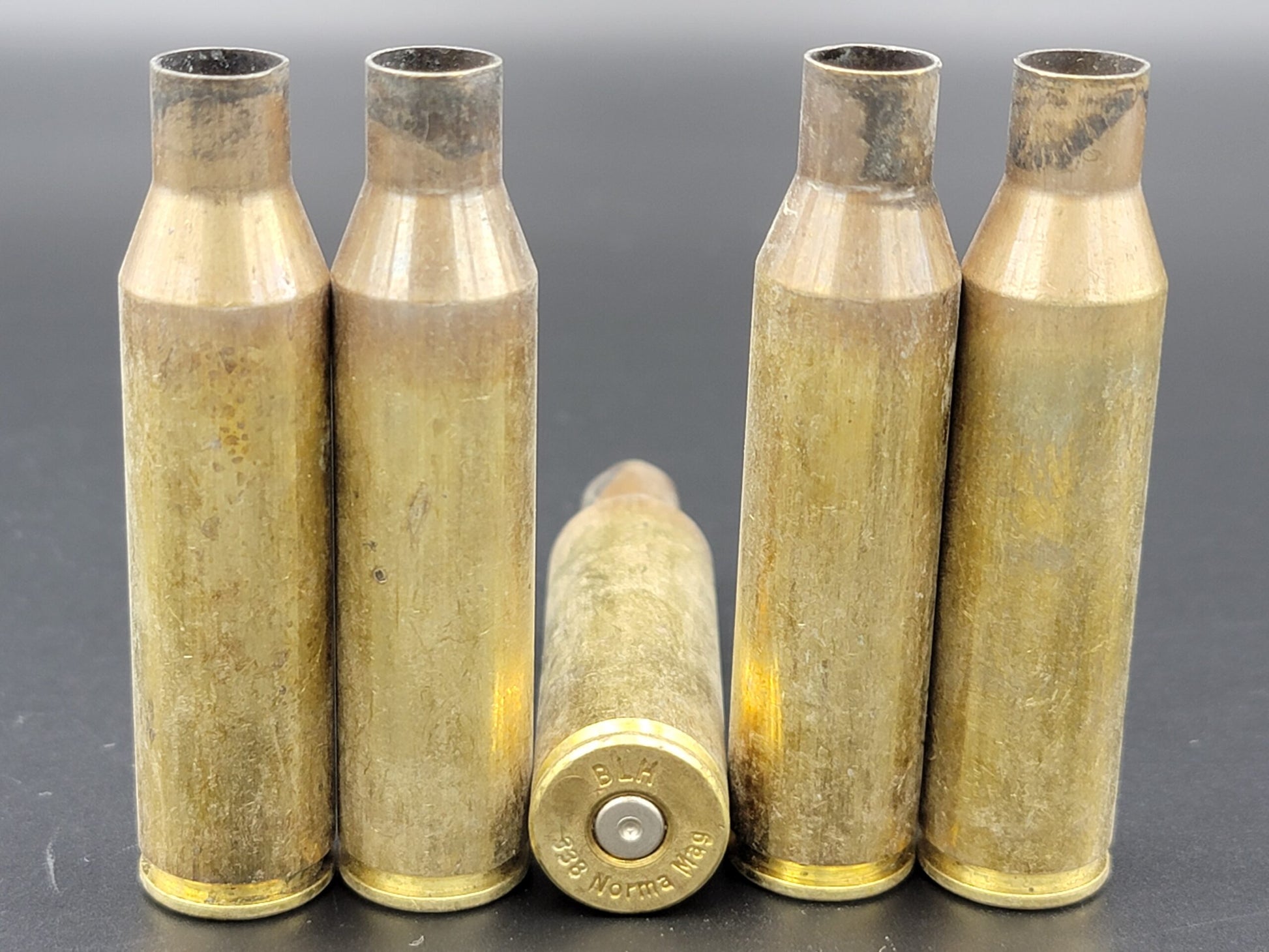 338 Norma Mag once fired rifle brass. Hand sorted from reputable indoor/military ranges for reloading. Reliable spent casings for precision shooting.