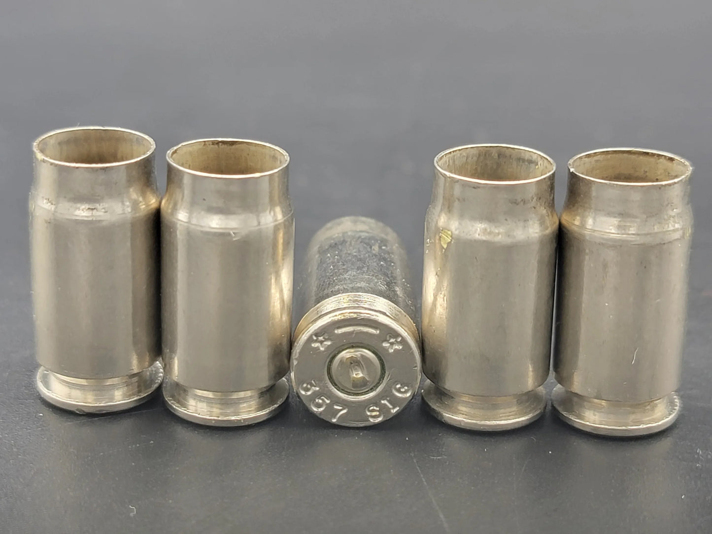 357 Sig once fired pistol nickel. Hand sorted from reputable indoor/military ranges for reloading. Reliable spent casings for precision shooting.