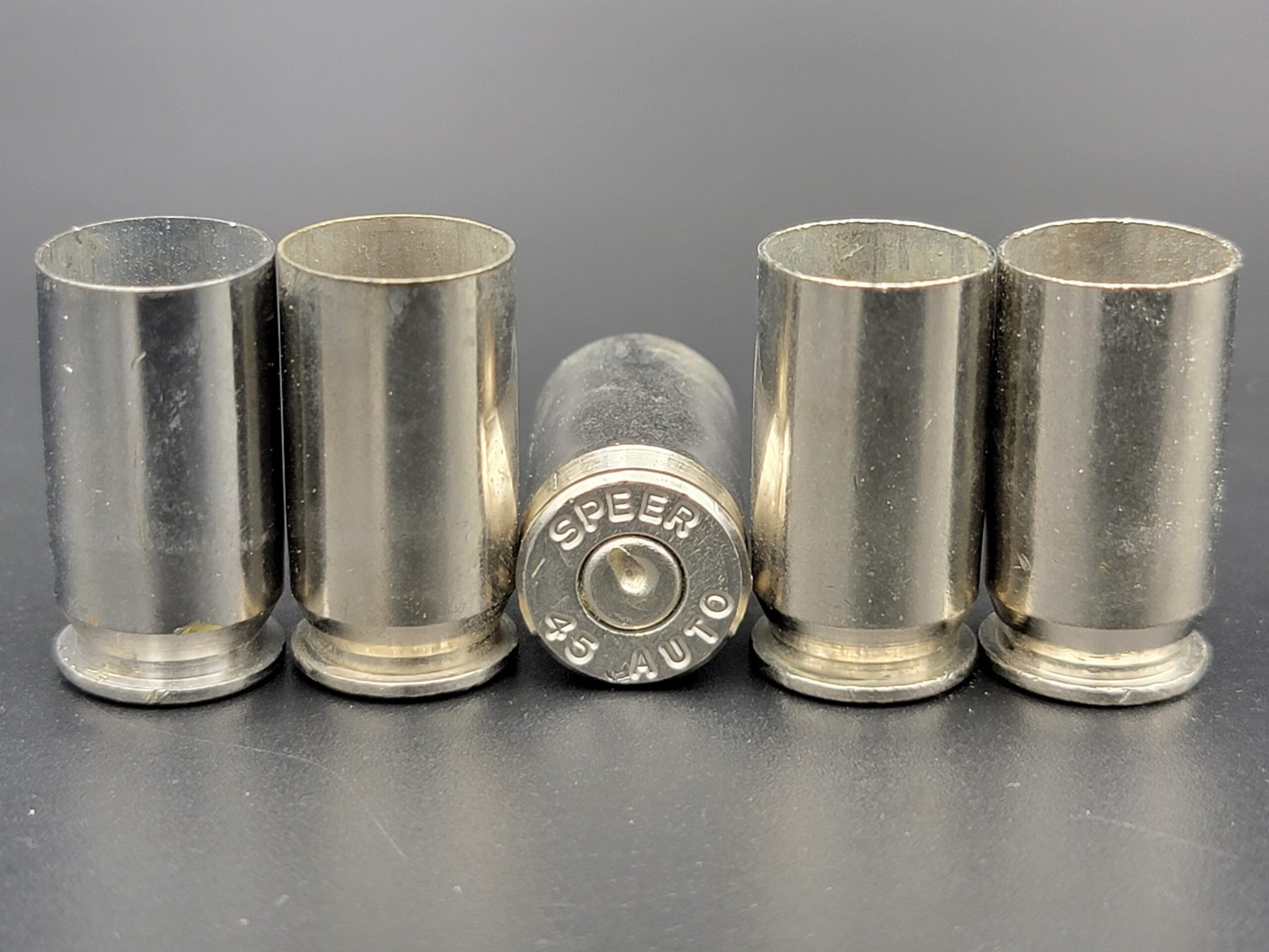 45 ACP LP/SP once fired pistol nickel. Hand sorted from reputable indoor/military ranges for reloading. Reliable spent casings for precision shooting.